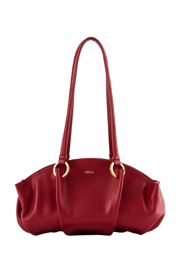 Bolsa baguette em couro legítimo na cor vermelha merlot com fechamento por zíper e alça de ombro confortável, design sofisticado e funcional ideal para o dia a dia.