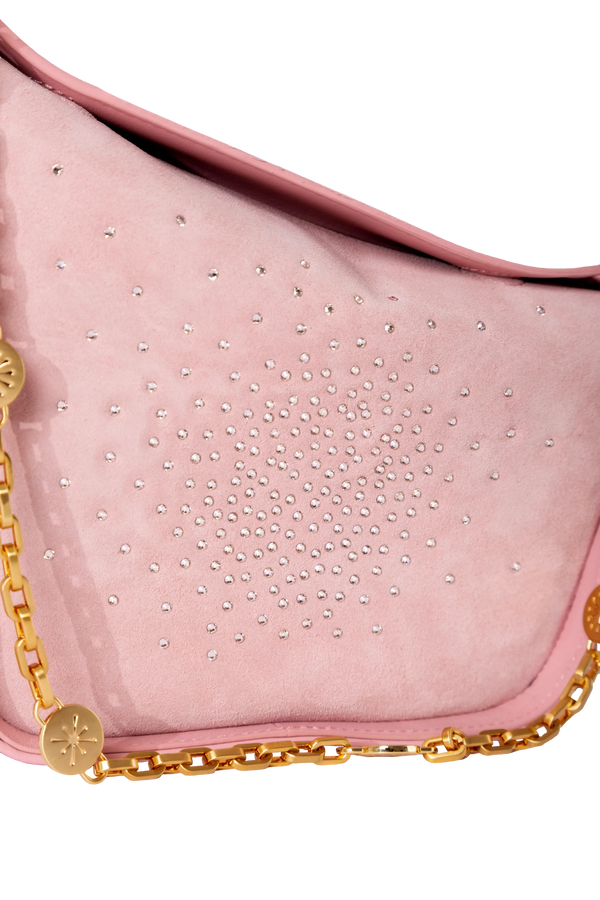 Bolsa em camurça na cor com tom elegante com fechamento por zíper e alça de ombro confortável, design sofisticado e funcional ideal para o dia a dia.