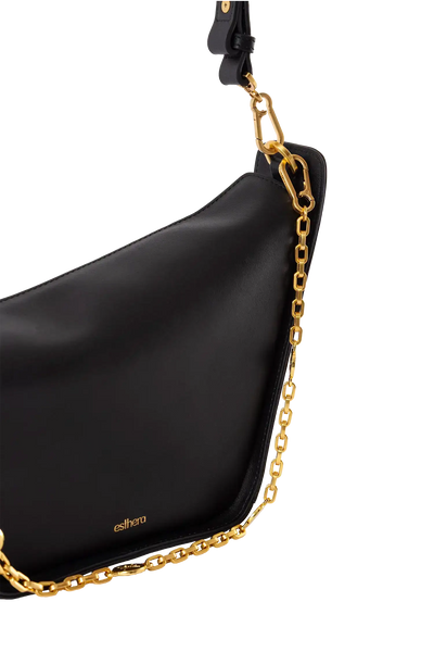 Bolsa em couro legítimo na cor preta com fechamento por zíper e alça de ombro confortável, design sofisticado e funcional ideal para o dia a dia.