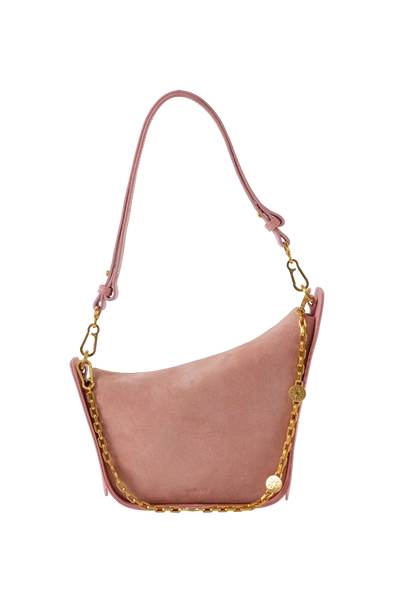 Bolsa em camurça na cor com tom elegante com fechamento por zíper e alça de ombro confortável, design sofisticado e funcional ideal para o dia a dia.
