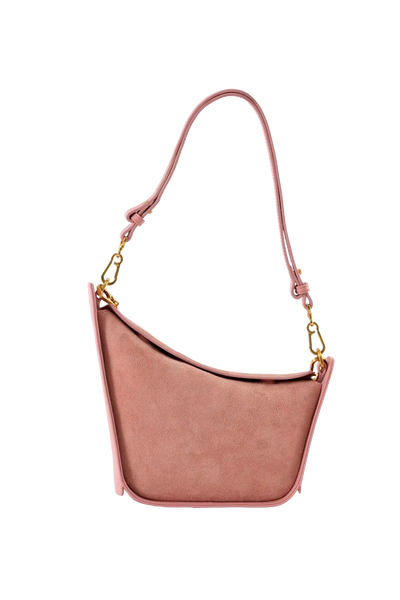 Bolsa em camurça na cor com tom elegante com fechamento por zíper e alça de ombro confortável, design sofisticado e funcional ideal para o dia a dia.