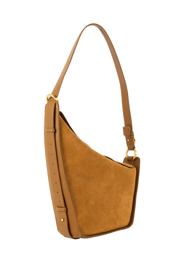 Bolsa em camurça na cor com tom elegante com fechamento seguro e alça ajustável confortável, design sofisticado e funcional ideal para o dia a dia.