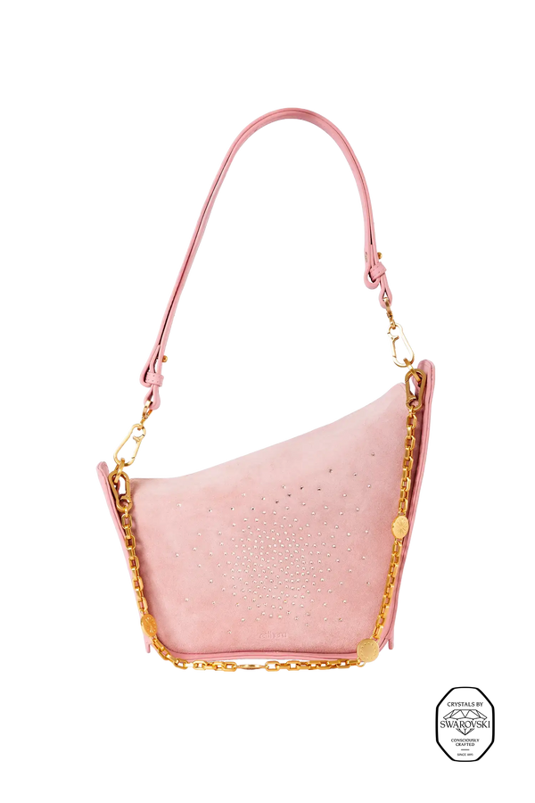 Bolsa em camurça na cor com tom elegante com fechamento por zíper e alça de ombro confortável, design sofisticado e funcional ideal para o dia a dia.