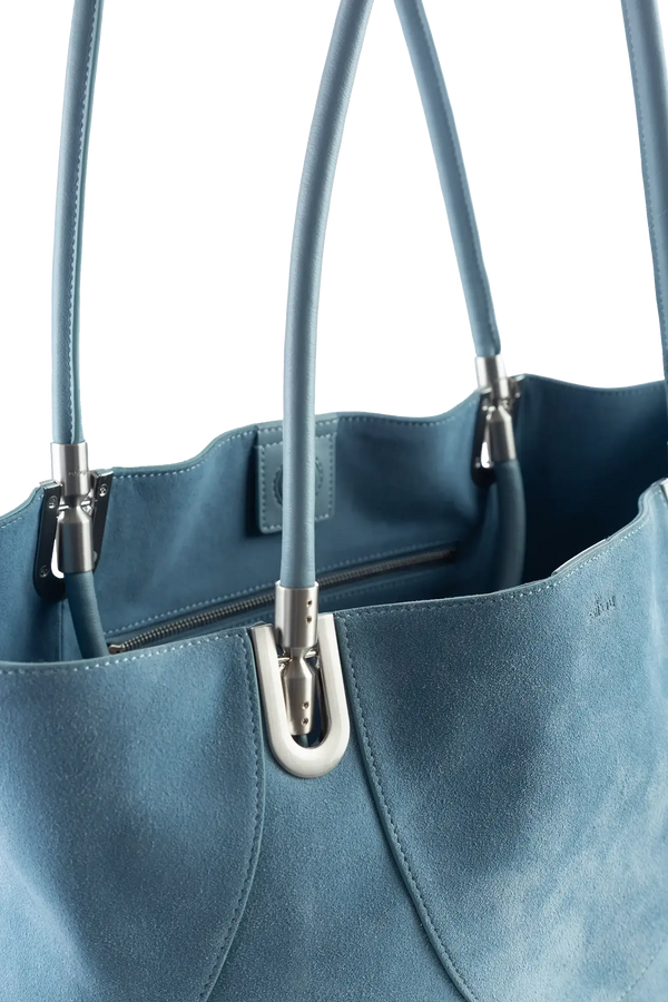 Bolsa de mão em couro legítimo na cor com tom elegante com fechamento seguro e alça ajustável confortável, design sofisticado e funcional ideal para o dia a dia.