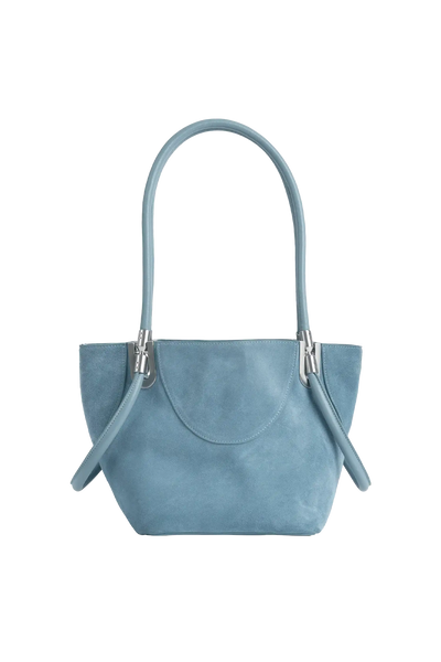 Bolsa de mão em camurça na cor com tom elegante com fechamento seguro e alça ajustável confortável, design sofisticado e funcional ideal para o dia a dia.