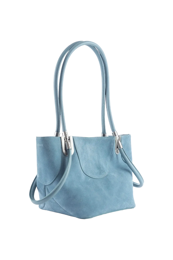 Bolsa de mão em camurça na cor com tom elegante com fechamento seguro e alça ajustável confortável, design sofisticado e funcional ideal para o dia a dia.