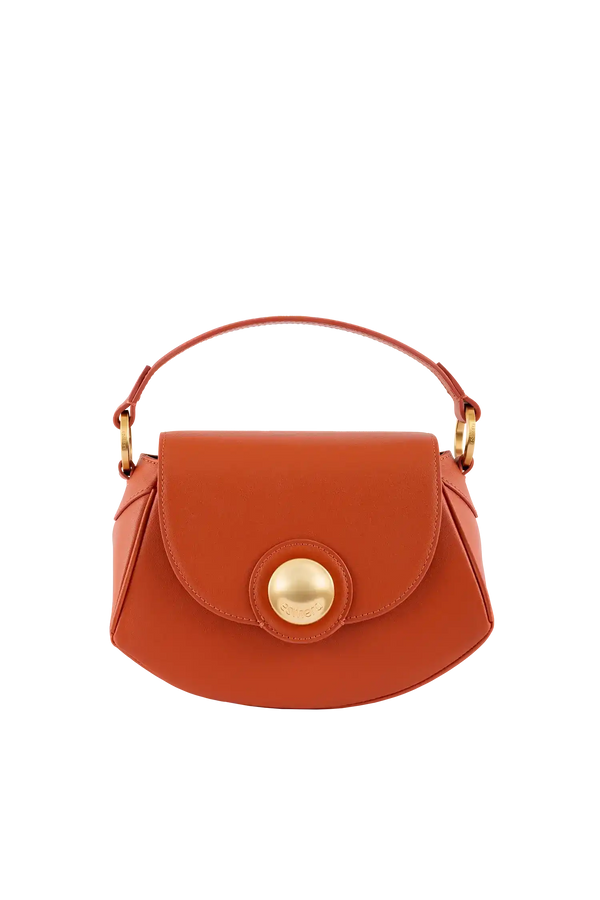 Bolsa feminina em couro laranja com alça de mão e detalhe dourado, design brasileiro e sofisticado
