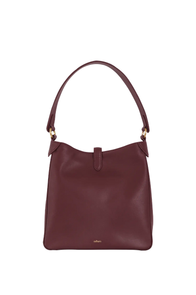 Bolsa de ombro em couro legítimo na cor burgundy com fecho refinado e alças estruturadas, design sofisticado e funcional ideal para o dia a dia.