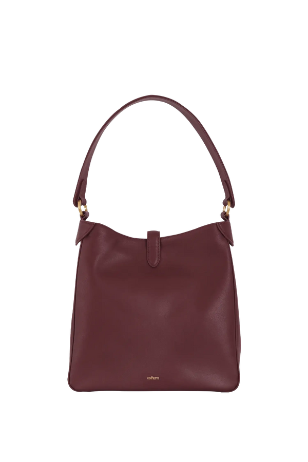 Bolsa de ombro em couro legítimo na cor burgundy com fecho refinado e alças estruturadas, design sofisticado e funcional ideal para o dia a dia.