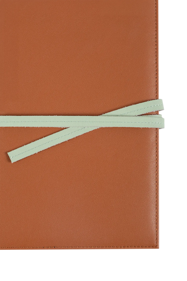 AMPM journal cover marrom