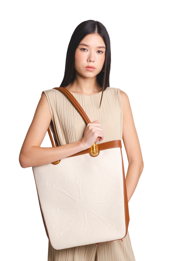 Bolsa de mão em couro legítimo na cor com tom elegante com fechamento seguro e alça ajustável confortável, design sofisticado e funcional ideal para o dia a dia.