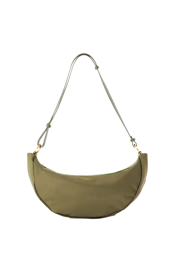 Bolsa tiracolo em couro legítimo na cor com tom elegante com fechamento seguro e alça ajustável confortável, design sofisticado e funcional ideal para o dia a dia.
