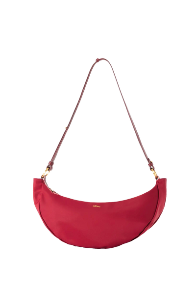 Bolsa tiracolo em couro legítimo na cor vermelha merlot com fechamento seguro e alça ajustável confortável, design sofisticado e funcional ideal para o dia a dia.