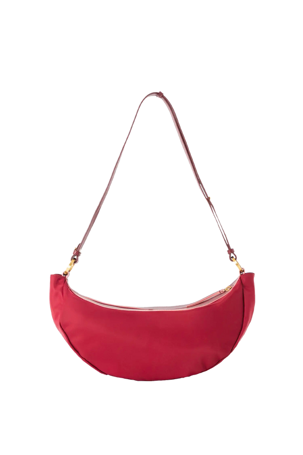 Bolsa tiracolo em couro legítimo na cor vermelha merlot com fechamento seguro e alça ajustável confortável, design sofisticado e funcional ideal para o dia a dia.