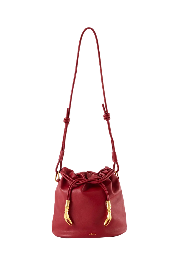 Bolsa tiracolo em couro legítimo na cor vermelha merlot com fechamento seguro e alça ajustável confortável, design sofisticado e funcional ideal para o dia a dia.